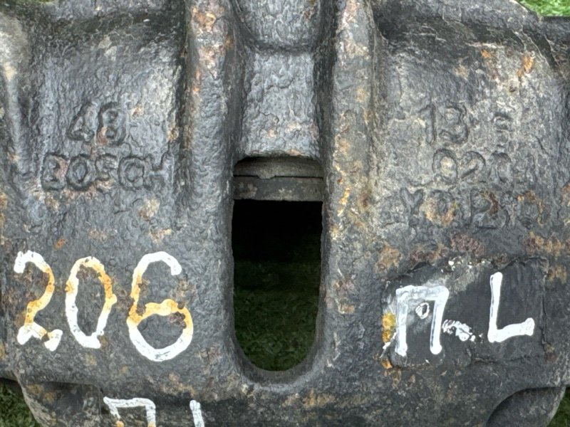 Суппорт тормозной Peugeot 206