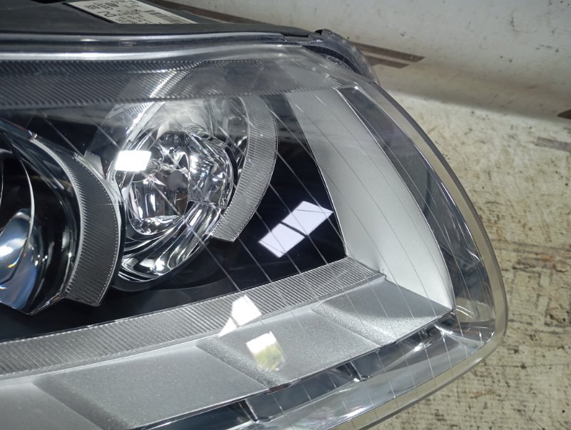Фары Audi A6 2010 C6