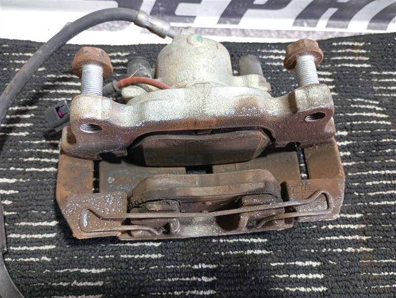 Суппорт тормозной Volkswagen Touran 2011 1T