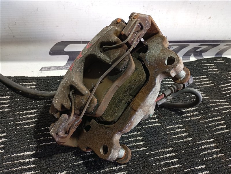 Суппорт тормозной Volkswagen Touran 2011 1T