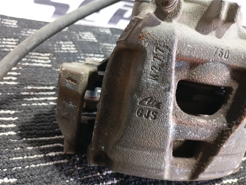 Суппорт тормозной Volkswagen Tiguan 2012 5N