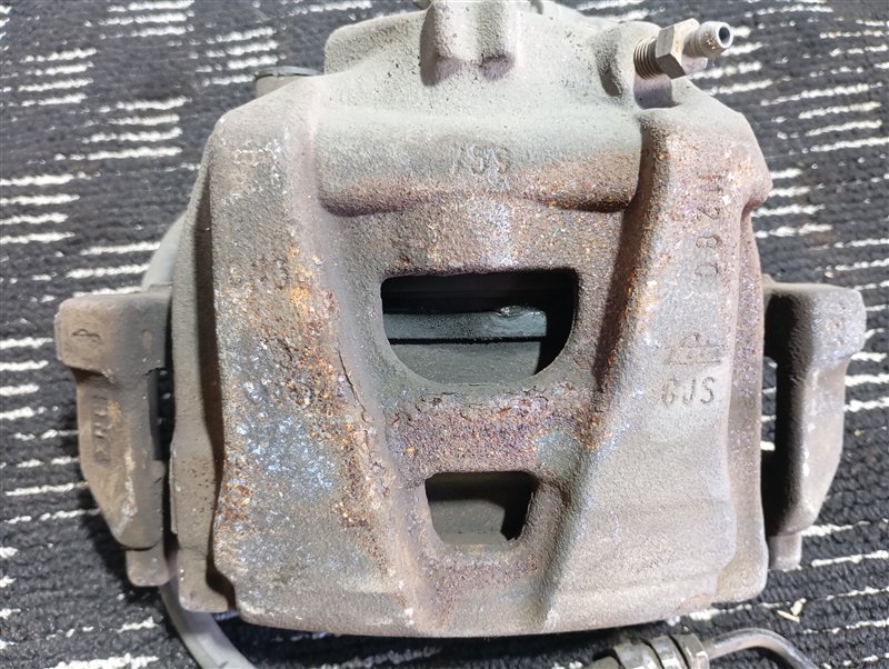 Суппорт тормозной Volkswagen Tiguan 2012 5N