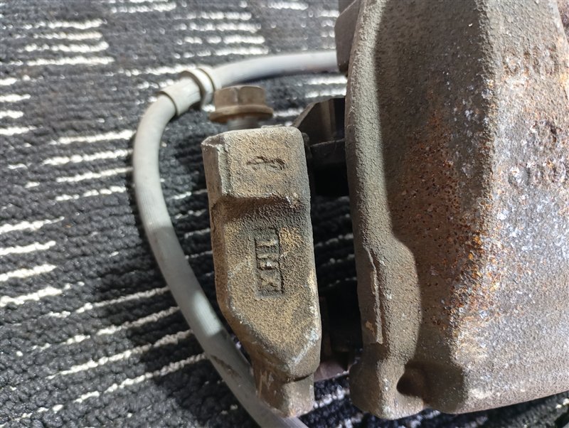 Суппорт тормозной Volkswagen Tiguan 2012 5N