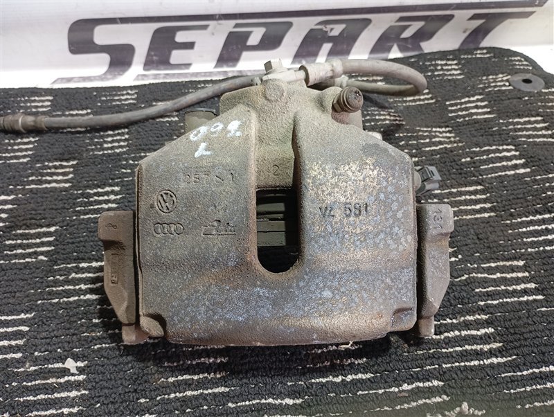 Суппорт тормозной Volkswagen Passat 2012 B7