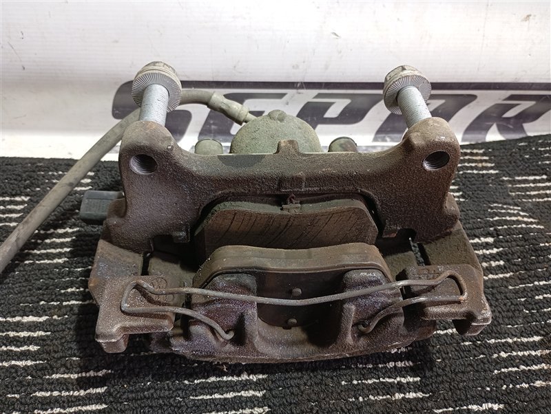 Суппорт тормозной Volkswagen Passat 2012 B7