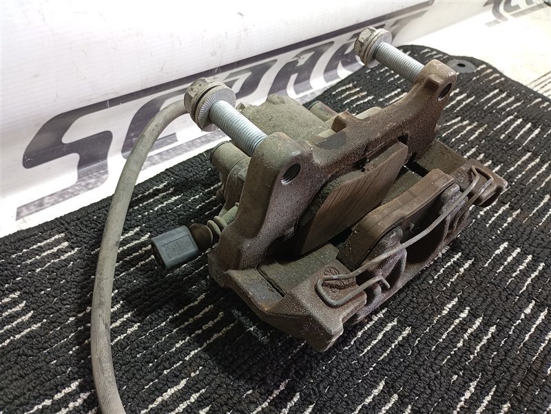 Суппорт тормозной Volkswagen Passat 2012 B7