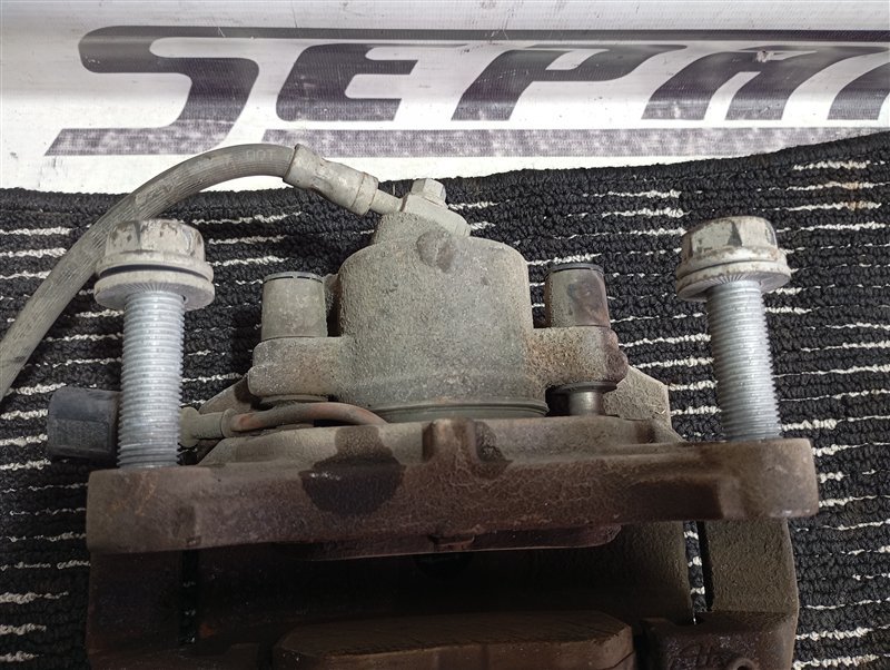 Суппорт тормозной Volkswagen Passat 2012 B7