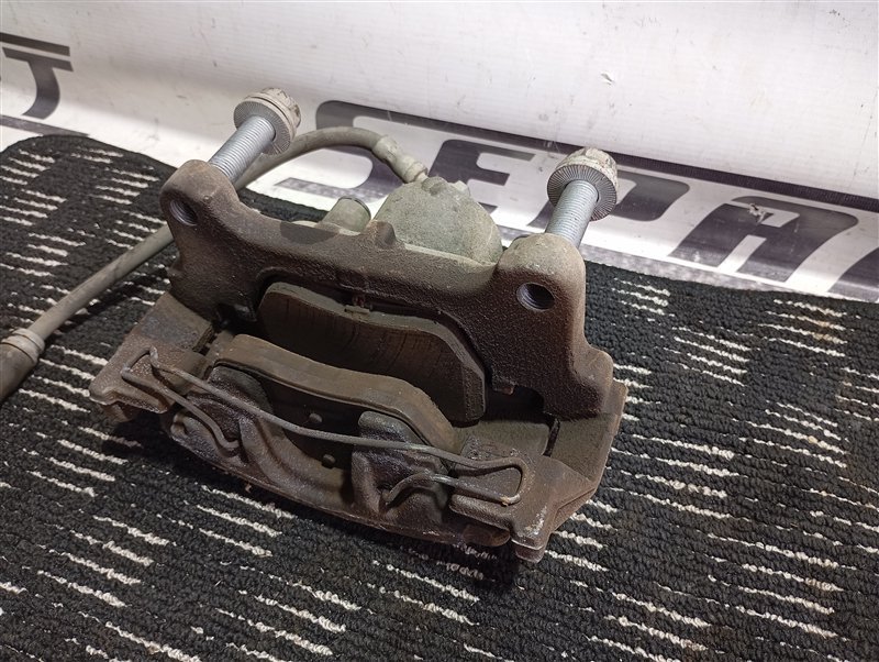 Суппорт тормозной Volkswagen Passat 2012 B7