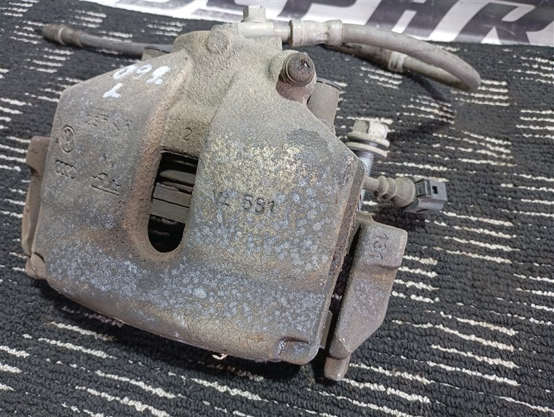 Суппорт тормозной Volkswagen Passat 2012 B7