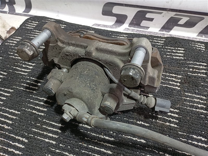 Суппорт тормозной Volkswagen Passat 2006 B6