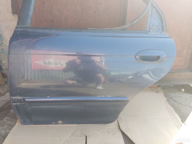Дверь Kia Spectra