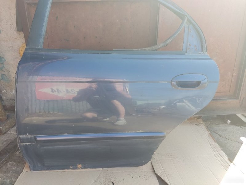Дверь Kia Spectra