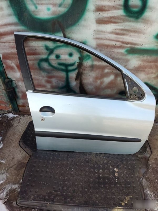 Дверь Peugeot 206