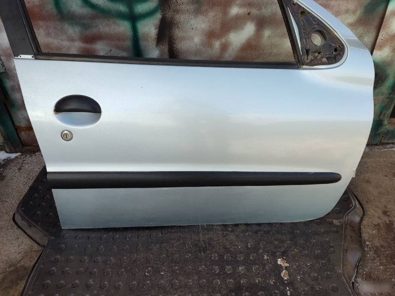 Дверь Peugeot 206