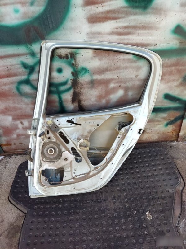 Дверь Peugeot 206