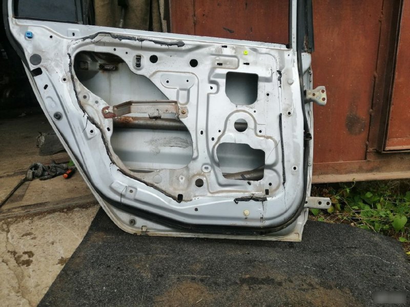 Дверь Mitsubishi Lancer 9