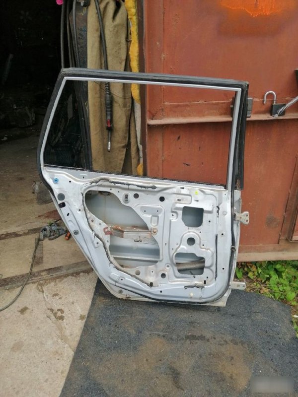 Дверь Mitsubishi Lancer 9