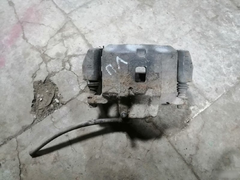 Суппорт тормозной Mitsubishi Lancer 9