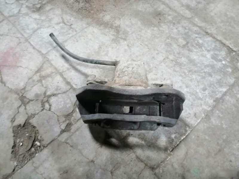 Суппорт тормозной Mitsubishi Lancer 9