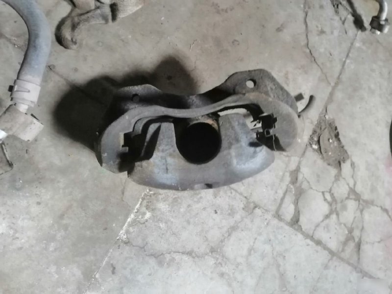 Суппорт тормозной Mitsubishi Lancer 9