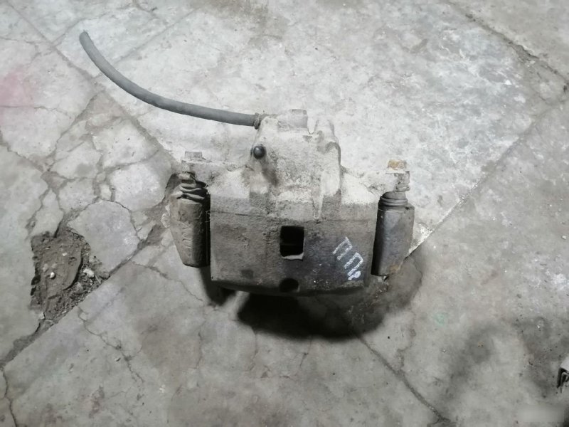 Суппорт тормозной Mitsubishi Lancer 9