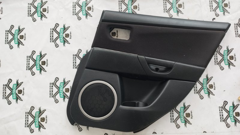 Обшивка боковой двери Mazda 3 BK