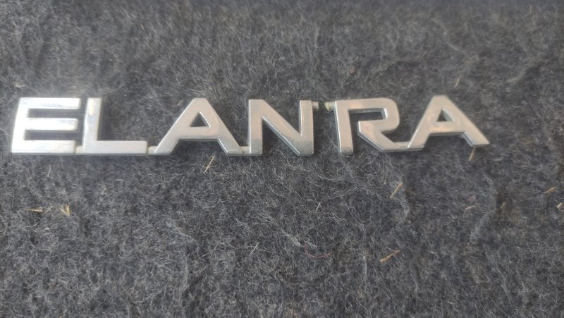 Эмблема Hyundai Elantra 2005 XD