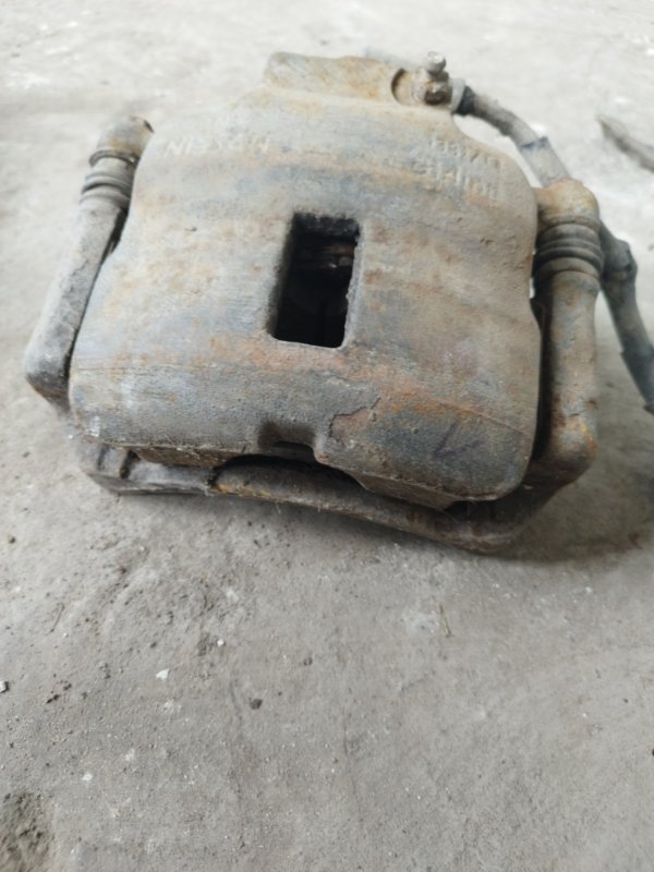 Суппорт тормозной Nissan Primera P10