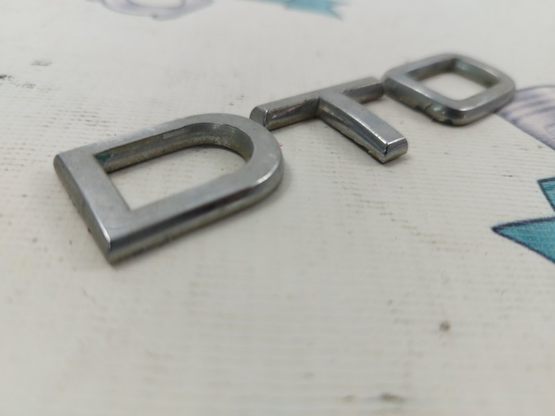 Эмблема AUDI Q5