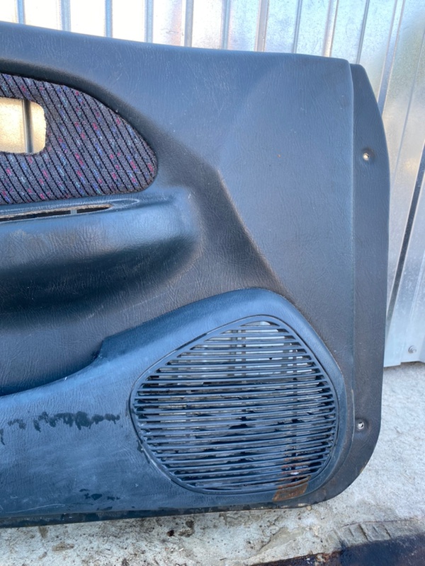 Обшивка боковой двери Nissan Almera N15