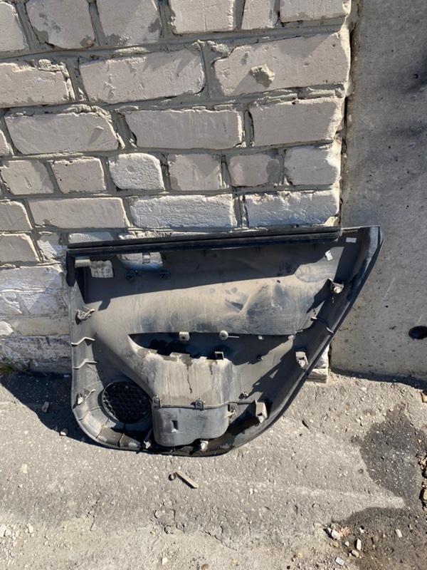 Обшивка боковой двери Subaru Impreza