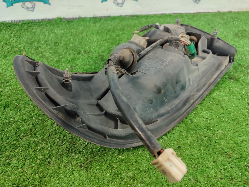 Фонарь заднего хода Toyota carina 1993 ST190
