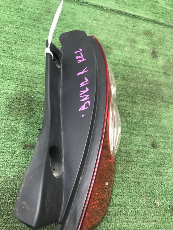 Фонарь в крыло NISSAN March 2009 BNK12