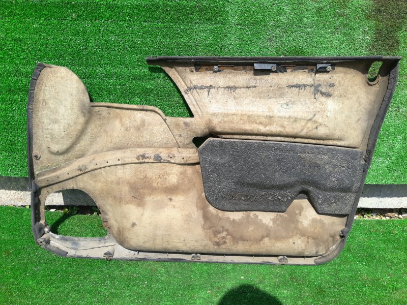 Обшивка двери Opel Omega B