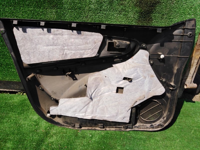 Обшивка двери Geely MK Cross