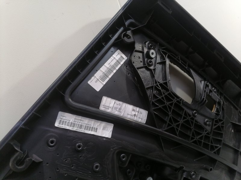 Обшивка двери BMW E87