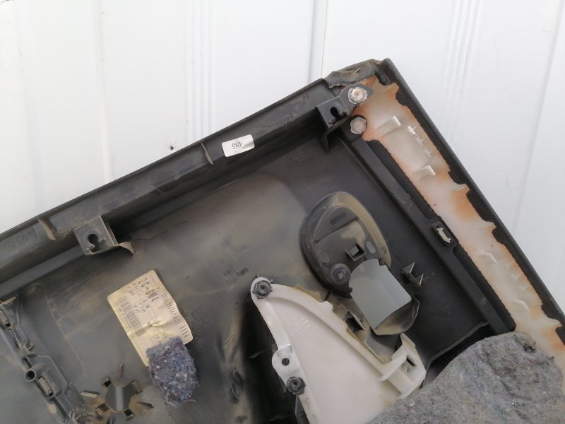 Обшивка двери Toyota Corolla E150