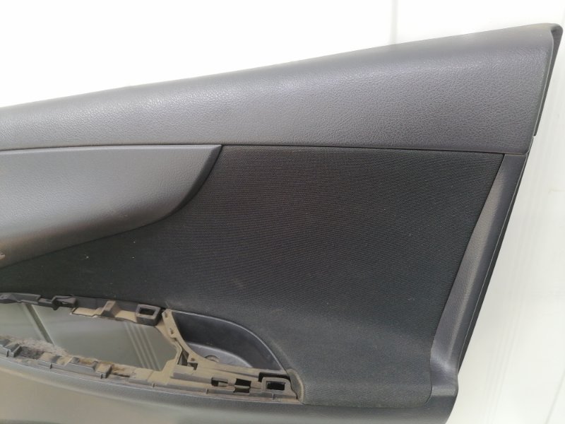 Обшивка двери Toyota Corolla E150