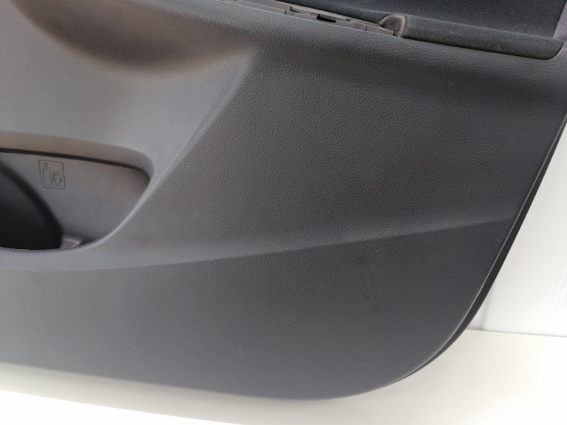 Обшивка двери Toyota Corolla E150