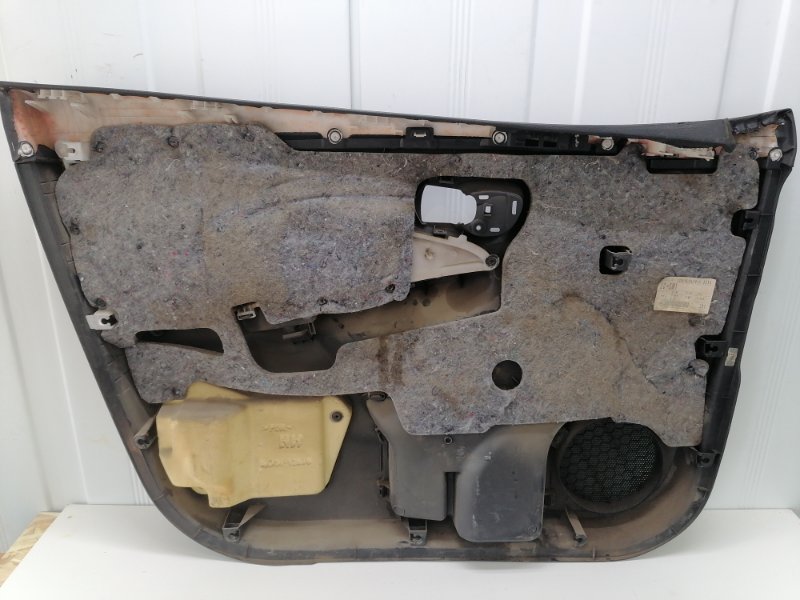 Обшивка двери Toyota Corolla E150
