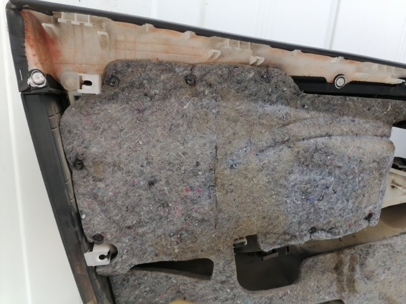 Обшивка двери Toyota Corolla E150