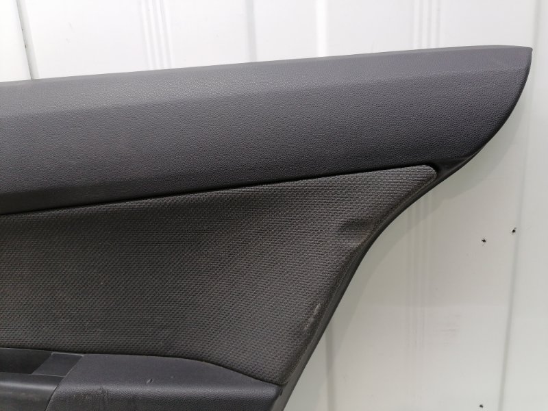 Обшивка двери Opel Astra H