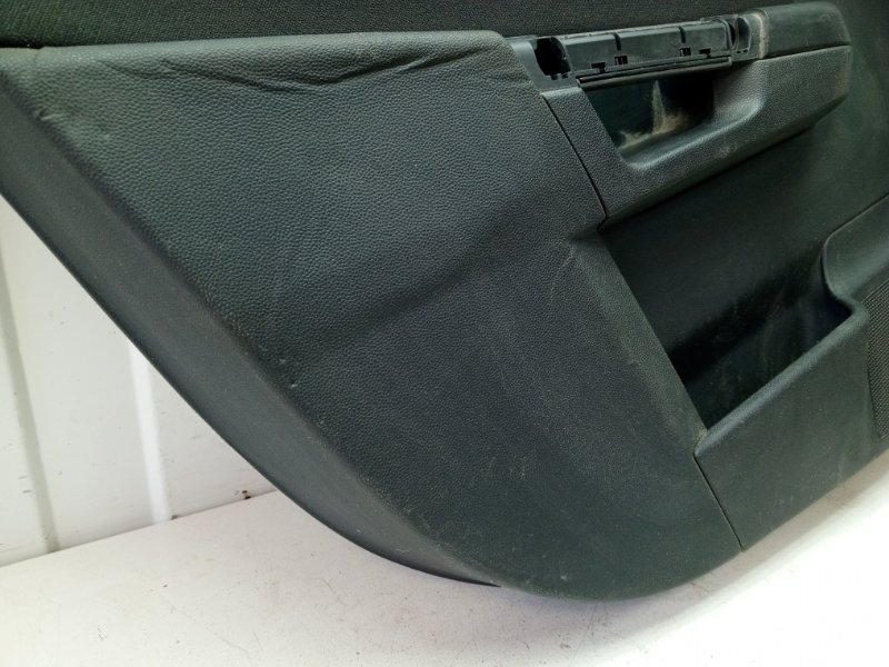 Обшивка двери Opel Astra H