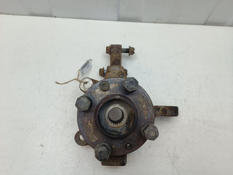 Кулак поворотный Nissan Note E11