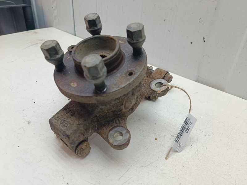 Кулак поворотный Nissan Note E11