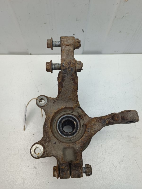 Кулак поворотный Nissan Note E11