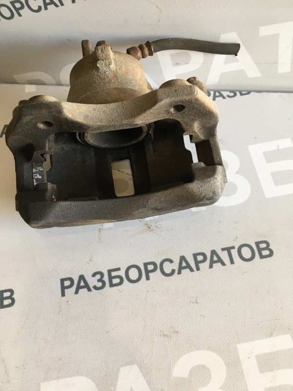 Суппорт тормозной передний Nissan Almera N16 2005 хэтчбек