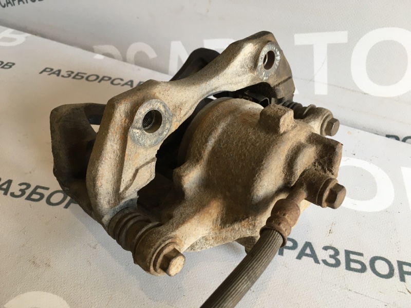 Суппорт тормозной передний Nissan Almera N16 2005 хэтчбек