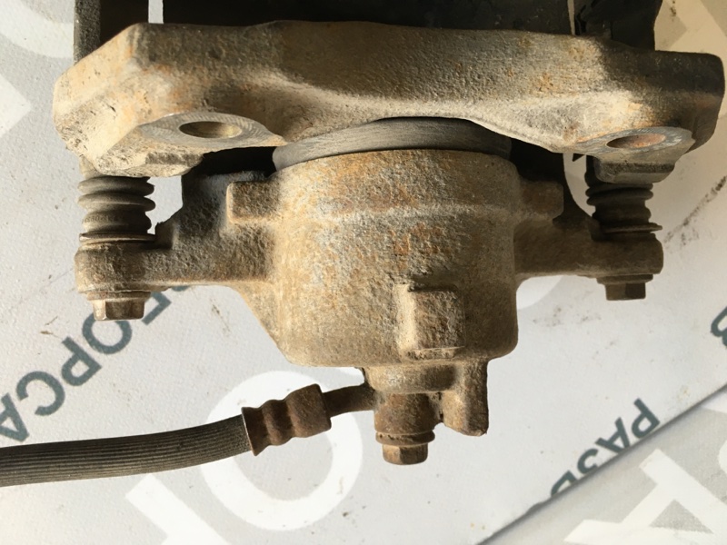 Суппорт тормозной передний Nissan Almera N16 2005 хэтчбек