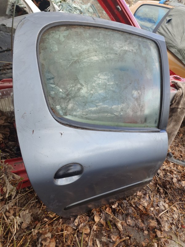 Дверь Peugeot 206